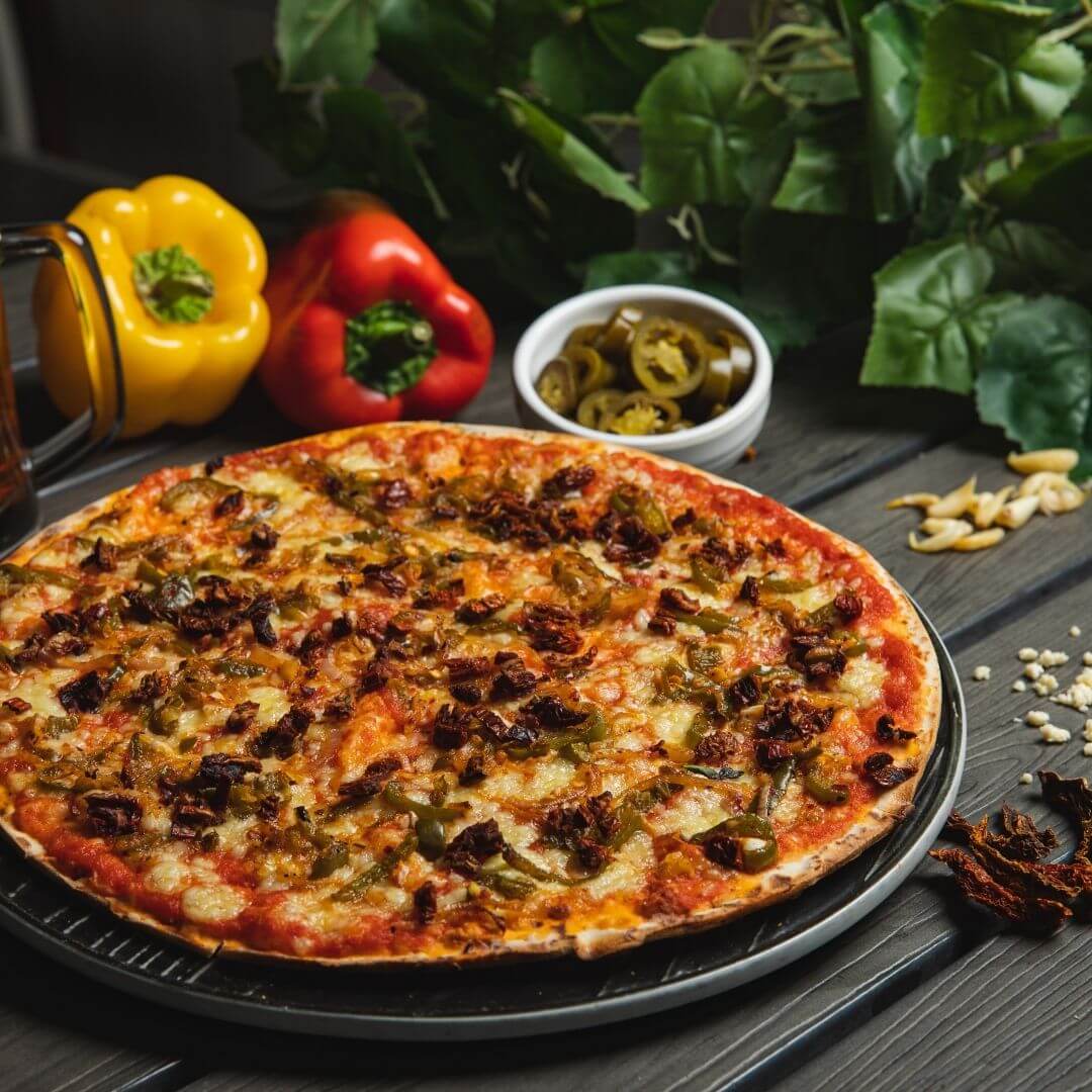 La Pizzeria’s Signature thin crust wood fired vegetarian pizzas